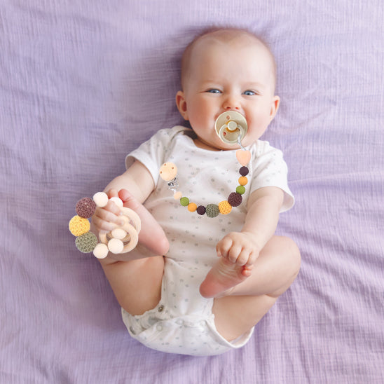 Attache tetine terre