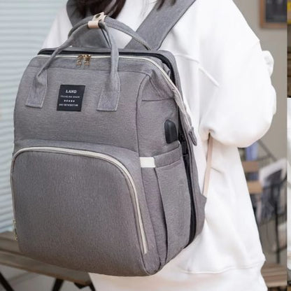 Sac-à-dos-à-langer-gris-femme